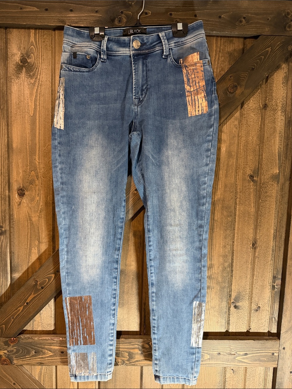 Faded Blue Skinny Jeans with Patch Panels